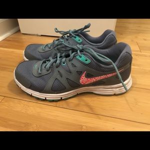 Gray Nike running shoes